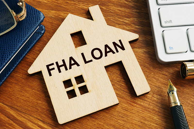 FHA loan engraved in wood 