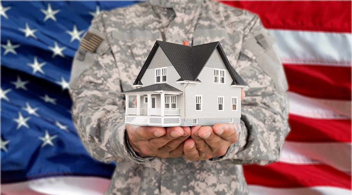 Veteran Holding Home with American flag background